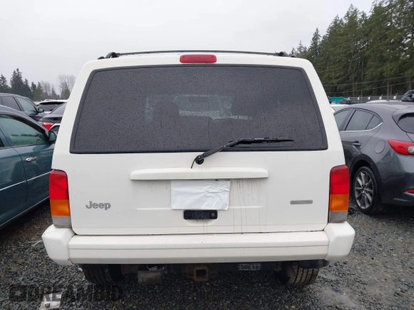 2000 Jeep Cherokee Classic with VIN 1J4FF58S4YL136213, listed as a IAAI auction lot 41227447 with 327,570 mi miles. Bid and sale history available at carsss.com. Image 16.