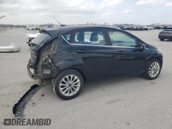 2017 Ford Fiesta Titanium with VIN 3FADP4FJXHM142648, listed as a Copart auction lot 48975125 with 82,042 mi miles and Salvage Title. Bid and sale history available at DreamBid. Image 3.