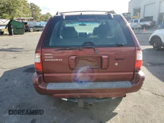 2002 Isuzu Rodeo S with VIN 4S2CK58W324325318, listed as a Copart auction lot 78851294 with 166,323 mi miles and Salvage Title. Bid and sale history available at DreamBid. Image 6.