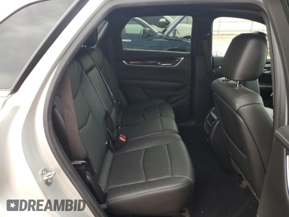 2020 Cadillac XT5 Premium Luxury FWD z VIN 1GYKNCRS1LZ191485, wystawiony jako Copart lot #54657525 z przebiegiem Nie podano mil oraz Szkoda całkowita • Salvage title. Historia ofert i sprzedaży dostępna na DreamBid. Obrazek 11.