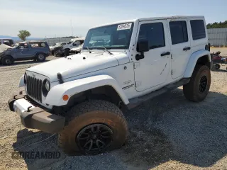 2015 Jeep Wrangler Unlimited Sahara with VIN 1C4BJWEG8FL745620, listed as a Copart auction lot 62094515 with 115,327 mi miles and Salvage title. Bid and sale history available at DreamBid. Image 1.