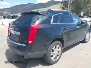 2012 Cadillac SRX Luxury Collection with VIN 3GYFNAE38CS635205, listed as a IAAI auction lot 41970482 with 220,593 mi miles and . Bid and sale history available at DreamBid. Image 4.