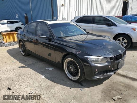 2015 BMW 3 Series 328i xDrive with VIN WBA3B5C59FP653564, listed as a Copart auction lot 64702115 with 92,821 mi miles and Salvage title. Bid and sale history available at DreamBid. Image 4.