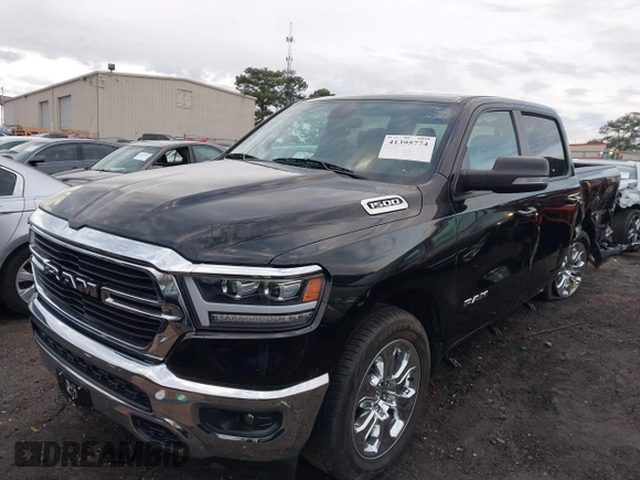 2021 Ram 1500 Big Horn z VIN 1C6RREFG1MN532758, wystawiony jako IAAI lot #41395774 z przebiegiem 66 750 mil mil oraz . Historia ofert i sprzedaży dostępna na DreamBid. Obrazek 6.