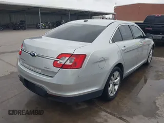 2011 Ford Taurus SEL with VIN 1FAHP2EW1BG117660, listed as a IAAI auction lot 42133767 with 204,965 mi miles and . Bid and sale history available at DreamBid. Image 4.