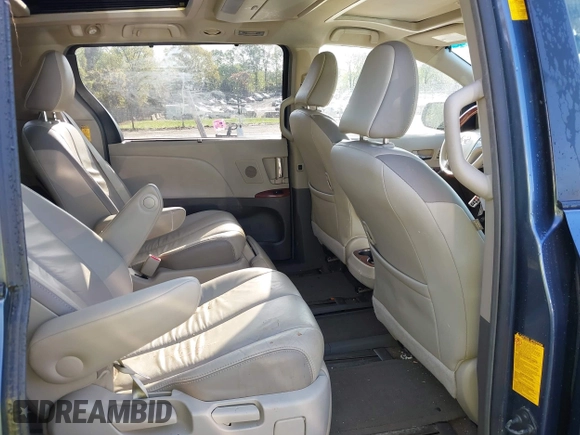 2014 Toyota Sienna XLE z VIN 5TDYK3DCXES498828, wystawiony jako IAAI lot #41970991 z przebiegiem 75 015 mil mil oraz . Historia ofert i sprzedaży dostępna na DreamBid. Obrazek 8.