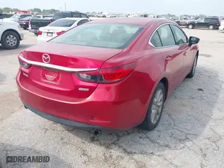 2016 Mazda Mazda6 i Sport with VIN JM1GJ1U56G1409311, listed as a IAAI auction lot 41906256 with 126,548 mi miles. Bid and sale history available at carsss.com. Image 4.