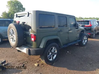 2015 Jeep Wrangler Unlimited Altitude с VIN 1C4HJWEG7FL584395, выставлен на аукционе IAAI как лот 42399987 с пробегом 142 906 миль миль и . История ставок и продаж доступна на DreamBid. Изображение 4.