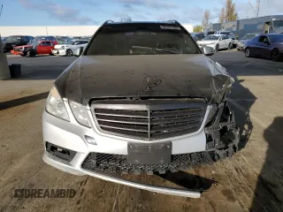 2011 Mercedes-Benz E 350 Luxury with VIN WDDHH8HB8BA351807, listed as a Copart auction lot 52191165 with 122,509 mi miles and Salvage Title. Bid and sale history available at DreamBid. Image 5.
