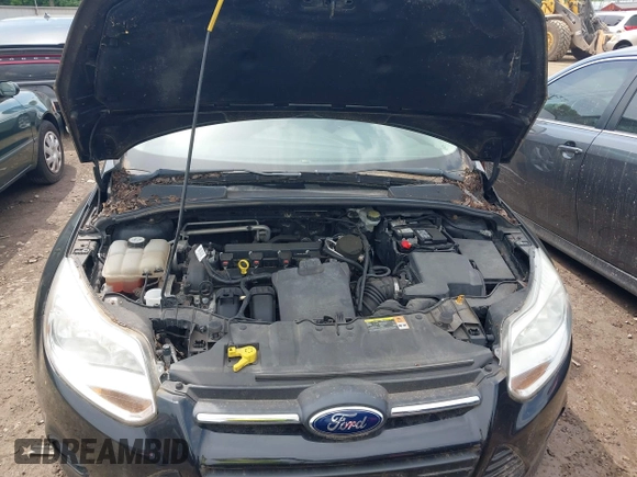 2013 Ford Focus SE z VIN 1FADP3F27DL183754, wystawiony jako IAAI lot #42677654 z przebiegiem 117 966 mil mil oraz . Historia ofert i sprzedaży dostępna na DreamBid. Obrazek 9.