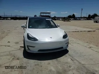 2023 Tesla Model 3 z VIN 5YJ3E1EA7PF549633, wystawiony jako Copart lot #57131325 z przebiegiem 78 113 mil mil oraz Szkoda całkowita • Salvage title. Historia ofert i sprzedaży dostępna na DreamBid. Obrazek 13.
