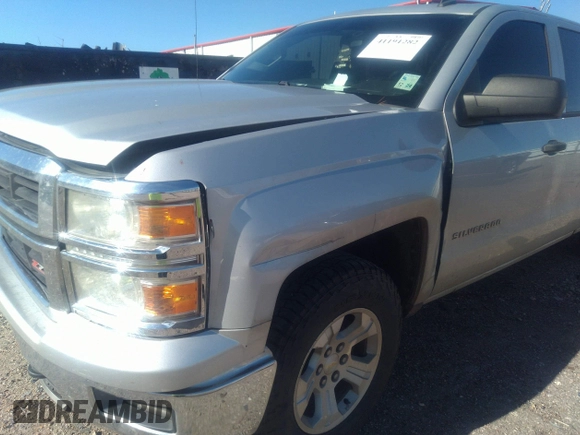 2014 Chevrolet Silverado 1500 LT with VIN 1GCVKREC7EZ120159, listed as a IAAI auction lot 41191282 with 206,836 mi miles and . Bid and sale history available at DreamBid. Image 18.