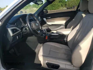 2015 BMW 2 Series 228i with VIN WBA1K5C51FV474079, listed as a Copart auction lot 57457875 with 62,946 mi miles and Salvage title. Bid and sale history available at DreamBid. Image 7.