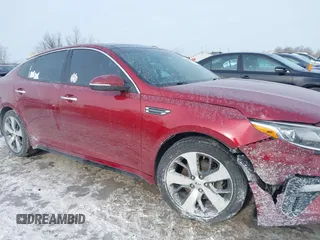 2019 Kia Optima LX with VIN 5XXGT4L31KG349821, listed as a IAAI auction lot 41366118 with 94,181 mi miles. Bid and sale history available at carsss.com. Image 13.
