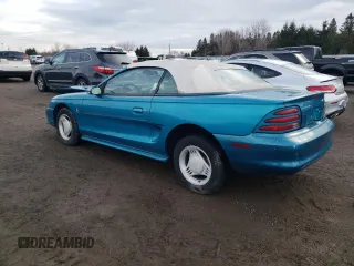 1994 Ford Mustang with VIN 1FALP4444RF169919, listed as a Copart auction lot 86349994 with 273,020 mi miles and Salvage title. Bid and sale history available at DreamBid. Image 2.