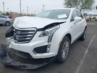 2019 Cadillac XT5 Luxury FWD with VIN 1GYKNCRS2KZ158560, listed as a IAAI auction lot 42067397 with 48,816 mi miles and . Bid and sale history available at DreamBid. Image 2.