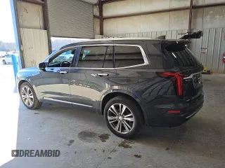 2021 Cadillac XT6 Premium Luxury z VIN 1GYKPDRS7MZ179150, wystawiony jako Copart lot #44894625 z przebiegiem 48 869 mil mil oraz Czysty tytuł • Clean title. Historia ofert i sprzedaży dostępna na DreamBid. Obrazek 2.