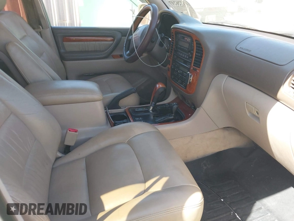 2000 Lexus LX 470 with VIN JT6HT00W5Y0080249, listed as a IAAI auction lot 41726247 with 315,707 mi miles and . Bid and sale history available at carsss.com. Image 5.