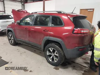 2015 Jeep Cherokee Trailhawk with VIN 1C4PJMBS7FW646577, listed as a IAAI auction lot 41404911 with 85,343 mi miles and . Bid and sale history available at DreamBid. Image 3.