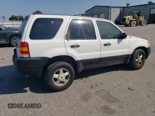 2004 Ford Escape XLS with VIN 1FMYU021X4DA07352, listed as a Copart auction lot 68909864 with 275,776 mi miles and Salvage Title. Bid and sale history available at carsss.com. Image 3.