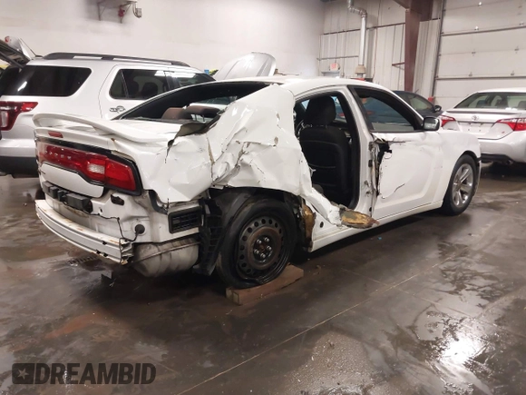 2013 Dodge Charger SE with VIN 2C3CDXBG2DH726467, listed as a IAAI auction lot 38024398 with 232,387 mi miles and . Bid and sale history available at carsss.com. Image 4.