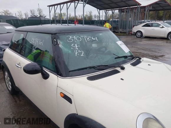 2004 MINI Hardtop with VIN WMWRC33434TJ60941, listed as a IAAI auction lot 39078161 with 143,107 mi miles and . Bid and sale history available at DreamBid. Image 19.