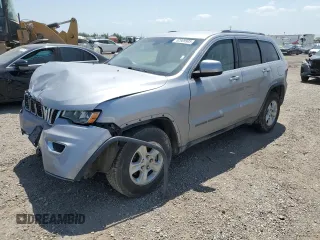 2017 Jeep Grand Cherokee Laredo with VIN 1C4RJEAG0HC816410, listed as a Copart auction lot 52909905 with 102,326 mi miles and Salvage title. Bid and sale history available at DreamBid. Image 1.