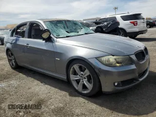 2010 BMW 3 Series 335i with VIN WBAPM7C50AA367346, listed as a Copart auction lot 50266965 with 121,205 mi miles and Salvage title. Bid and sale history available at DreamBid. Image 4.