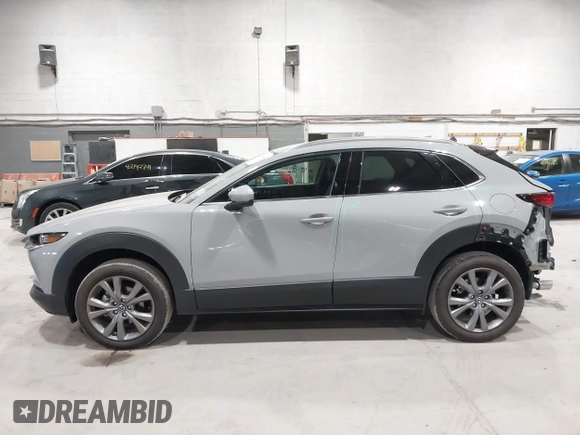 2025 Mazda CX-30 S Premium with VIN 3MVDMBDM5SM788786, listed as a IAAI auction lot 42126428 with 1,370 mi miles and . Bid and sale history available at DreamBid. Image 15.