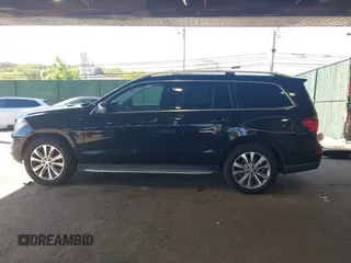 2014 Mercedes-Benz GL 450 z VIN 4JGDF7CE7EA395551, wystawiony jako IAAI lot #42247332 z przebiegiem 105 636 mil mil oraz . Historia ofert i sprzedaży dostępna na DreamBid. Obrazek 15.