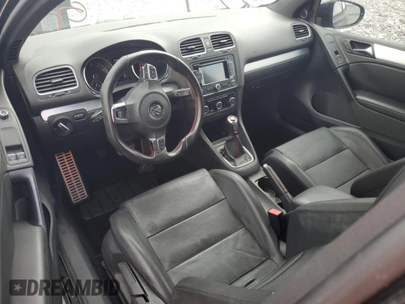 2012 Volkswagen GTI w/Conv & Sunroof z VIN WVWEV7AJ1CW090672, wystawiony jako Copart lot #71884774 z przebiegiem 116 996 mil mil oraz Szkoda całkowita • Salvage title. Historia ofert i sprzedaży dostępna na DreamBid. Obrazek 8.