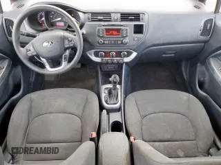 2013 Kia Rio EX with VIN KNADN4A38D6303580, listed as a Copart auction lot 63126825 with 103,675 mi miles and Salvage title. Bid and sale history available at DreamBid. Image 8.