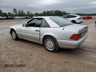 1997 Mercedes-Benz SL-Class with VIN WDBFA63F4VF148651, listed as a Copart auction lot 75893884 with 96,697 mi miles and Clean Title. Bid and sale history available at carsss.com. Image 2.