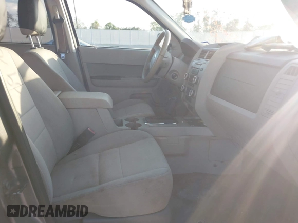 2011 Ford Escape XLT with VIN 1FMCU0D70BKA27369, listed as a IAAI auction lot 40970437 with 119,719 mi miles. Bid and sale history available at carsss.com. Image 5.