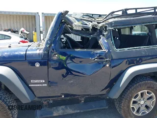 2013 Jeep Wrangler Sport with VIN 1C4AJWAG3DL627179, listed as a IAAI auction lot 42262246 with 33,536 mi miles and . Bid and sale history available at DreamBid. Image 6.