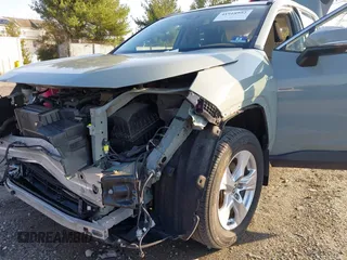 2019 Toyota RAV4 Hybrid XLE with VIN JTMRWRFV0KD013274, listed as a IAAI auction lot 41918992 with 97,850 mi miles. Bid and sale history available at carsss.com. Image 17.