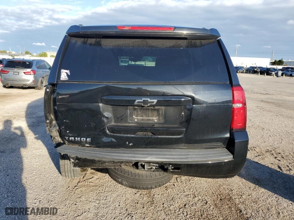 2019 Chevrolet Tahoe LT with VIN 1GNSCBKC0KR266577, listed as a Copart auction lot 79674694 with 75,002 mi miles and Salvage Title. Bid and sale history available at carsss.com. Image 6.