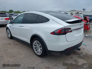2020 Tesla Model X Long Range with VIN 5YJXCBE23LF233484, listed as a IAAI auction lot 41886062 with 1 mi miles. Bid and sale history available at carsss.com. Image 3.
