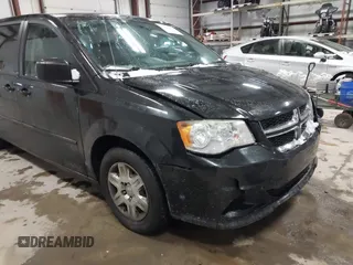 2012 Dodge Grand Caravan SE with VIN 2C4RDGBG8CR155758, listed as a IAAI auction lot 41300951 with 126,209 mi miles and . Bid and sale history available at DreamBid. Image 6.