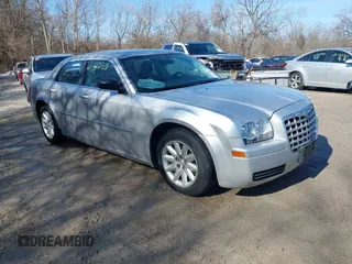 2008 Chrysler 300 LX with VIN 2C3KA43R48H251025, listed as a IAAI auction lot 41510553 with 104,103 mi miles. Bid and sale history available at carsss.com. Image 1.