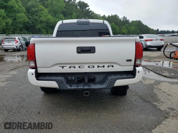 2017 Toyota Tacoma SR5 z VIN 5TFCZ5AN1HX113842, wystawiony jako Copart lot #60711285 z przebiegiem 124 799 mil mil oraz Szkoda całkowita • Salvage title. Historia ofert i sprzedaży dostępna na DreamBid. Obrazek 6.