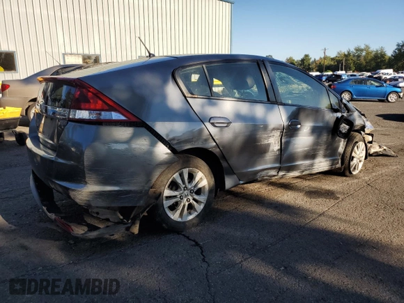 2012 Honda Insight EX z VIN JHMZE2H72CS006248, wystawiony jako Copart lot #73184844 z przebiegiem Nie podano mil oraz Szkoda całkowita • Salvage title. Historia ofert i sprzedaży dostępna na DreamBid. Obrazek 3.