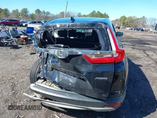 2019 Honda CR-V EX with VIN 2HKRW2H5XKH674504, listed as a IAAI auction lot 41823838 with 104,281 mi miles. Bid and sale history available at carsss.com. Image 15.