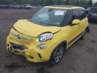 2014 FIAT 500L Trekking z VIN ZFBCFADH1EZ015579, wystawiony jako IAAI lot #42601733 z przebiegiem 185 909 mil mil oraz . Historia ofert i sprzedaży dostępna na DreamBid. Obrazek 2.