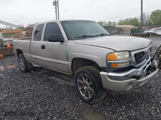 2004 GMC Sierra 1500 SLT with VIN 2GTEK19T841211511, listed as a IAAI auction lot 42099492 with 154,023 mi miles. Bid and sale history available at carsss.com. Image 1.