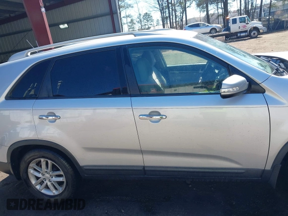 2014 Kia Sorento LX with VIN 5XYKT4A63EG457302, listed as a IAAI auction lot 41859779 with 122,724 mi miles. Bid and sale history available at carsss.com. Image 13.