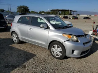 2009 Scion xD with VIN JTKKU10459J041424, listed as a Copart auction lot 62232525 with 223,790 mi miles and Salvage title. Bid and sale history available at DreamBid. Image 4.