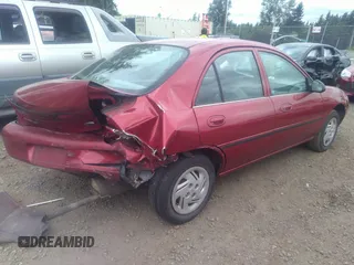 1998 Ford Escort LX с VIN 1FAFP10P4WW140458, выставлен на аукционе IAAI как лот 37094590 с пробегом 216 895 миль миль и . История ставок и продаж доступна на DreamBid. Изображение 4.