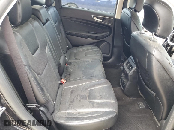 2019 Ford Edge Titanium z VIN 2FMPK3K91KBB54381, wystawiony jako Copart lot #52979555 z przebiegiem 99 127 mil mil oraz Szkoda całkowita • Salvage title. Historia ofert i sprzedaży dostępna na DreamBid. Obrazek 12.