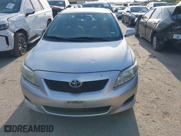 2009 Toyota Corolla with VIN 1NXBU40E59Z078727, listed as a IAAI auction lot 42035739 with 113,814 mi miles. Bid and sale history available at carsss.com. Image 6.